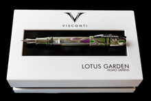Load image into Gallery viewer, The Visconti Homo Sapiens Lotus Garden Fountain Pen with the cap posted. Placed on top of its presentation box.