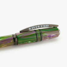Load image into Gallery viewer, Close up to the Visconti Homo Sapiens Lotus Garden Rollerball Pen Cap Clip. It has the word VISCONTI engraved on the sides.