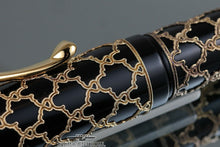 Load image into Gallery viewer, Close up to the filigree on the cap.