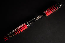 Load image into Gallery viewer, Top view of the Visconti Backgammon Fountain Pen with the cap set next to it.