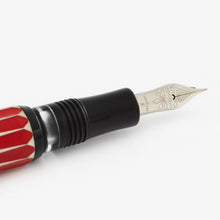 Load image into Gallery viewer, Close up to the Visconti Backgammon fountain pen nib. it has a set of decorations engraved with the word VISCONTI, 18kt 750, F