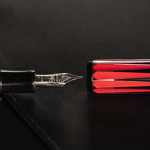 Load image into Gallery viewer, Close up to the nib and the cap on the Visconti Backgammon Fountain Pen.