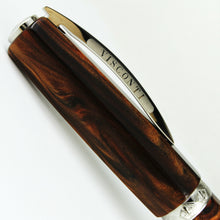 Load image into Gallery viewer, Close up to the side of the cap. The clip has the word VISCONTI engraved on the sides. The cap ring has an engraving of two fleur de lis icons.