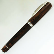 Load image into Gallery viewer, Side view of the fountain pen with the cap on, closed.