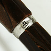 Load image into Gallery viewer, Close up to the cap ring with the word MEDICI engraved on it.