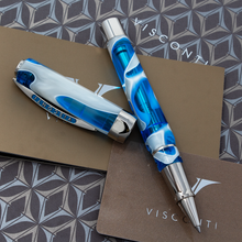 Load image into Gallery viewer, Visconti Opera Master Antartica Rollerball Pen with the cap set to the side.