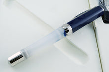 Load image into Gallery viewer, Side view of the fountain pen with the cap on.