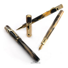 Load image into Gallery viewer, The three included pens arranged on a white background. The fountain pen has the cap off and set to the side. Behind it is the ballpoint pen, and in front is the rollerball pen with the cap on, closed.