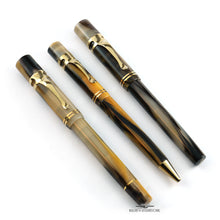 Load image into Gallery viewer, The three pens placed next to each other on a white background.