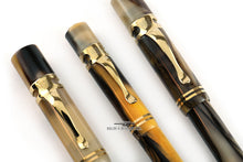 Load image into Gallery viewer, Close up to the pen clips on the set. They have a gold band at the top portion with the edition number. This one is 0250/1983