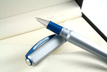 Load image into Gallery viewer, Close up to the rollerball pen leaning on the cap.