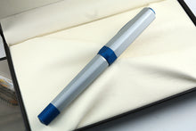 Load image into Gallery viewer, Back view of the rollerball pen with the cap on, closed.