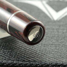 Load image into Gallery viewer, Close up to the edition number at the bottom of the fountain pen with silver trims. it is 003/300.