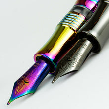 Load image into Gallery viewer, Close up to the nibs on the rainbow and blue moon pens. Both have decorations and Visconti 18K 750 Firenze