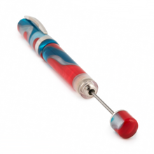 Load image into Gallery viewer, Angled close up to the Visconti Woodstock Lava Lamp Fountain pen. The piston lever is pulled.