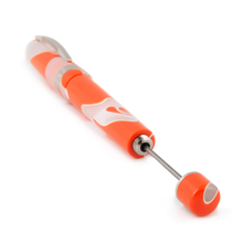 Load image into Gallery viewer, Angled close up to the Visconti Woodstock Orange Sunshine Fountain pen. The piston lever is pulled.