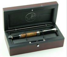 Load image into Gallery viewer, The pen inside its wooden presentation box. The inside is composed of black leather, and the lid's inside has the William Henry circular logo.