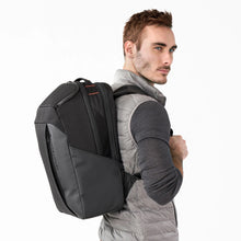 Load image into Gallery viewer, Briggs & Riley ZDX Cargo Backpack - Black
Image of Backpack shown on male model's back
Dimensions:  18 x 12 x 8.8"
Weight:           2.1 lbs.