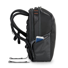 Load image into Gallery viewer, Briggs & Riley ZDX Cargo Backpack - Black
Image of left side zippered pocket.  Shown with smart phone in pocket.
Dimensions:  18 x 12 x 8.8"
Weight:           2.1 lbs.
