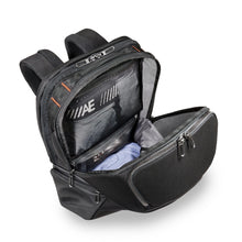 Load image into Gallery viewer, Briggs & Riley ZDX Cargo Backpack - Black
Image of Main Zippered Compartment.  Ideal for packing overnight essentials.
Dimensions:  18 x 12 x 8.8"
Weight:           2.1 lbs.