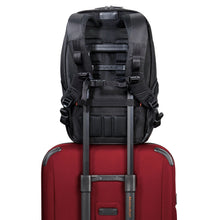 Load image into Gallery viewer, Briggs & Riley ZDX Cargo Backpack - Black
Image of Attachment strap, allowing this Backpack to conveniently ride along the telescoping handle of your wheeled trolley bag
Dimensions:  18 x 12 x 8.8"
Weight:           2.1 lbs.
