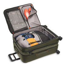 Load image into Gallery viewer, Briggs & Riley ZDX Medium Expandable Spinner - Green
Image of spacious interior main compartment shown with cinch down garment panels engaged to keep contents from shifting in transit. 
	Height	Width	Depth   Weight
US	26"	         18"	        12"	       10.4 lbs.
EU	66 cm	45.7 cm	30.5 cm	4.7 kg