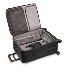 Load image into Gallery viewer, Briggs & Riley ZDX Medium Expandable Spinner - Black
Image of spacious interior main compartment. Includes generously sized cinch down garment panels which keeps contents from shifting in transit.
	Height	Width	Depth   Weight
US	26"	         18"	        12"	       10.4 lbs.
EU	66 cm	45.7 cm	30.5 cm	4.7 kg