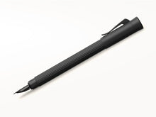 Load image into Gallery viewer, Side view of the matte black fountain pen with the cap posted.