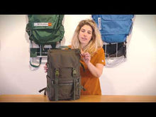 Load and play video in Gallery viewer, Review of the Rover Pack Tech showing the exterior compartments, zippers, gear attachment points, expandable bottle pockets, reflective paracords, cinch closure, spacious interior, laptop compartment, and padded straps and back panel.