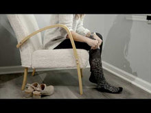 Load and play video in Gallery viewer, Instructions to put on the compression socks.