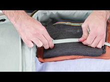 Load and play video in Gallery viewer, Review of the Aion carry-on suitcase, featuring the spacious interior with adjustable straps, organization pockets, and telescopic handle.