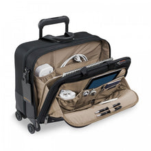 Load image into Gallery viewer, Briggs & Riley @Work Large Spinner Brief - Black
Image of Front Angled View Showing Middle Divided Compartment including file divider and two accessory pockets.  Also showing front business organizer compartment, ideal for cables, cords, power bank, pens, passport, etc.
	Height	Width	Depth	Weight
US	15 in	17.5 in	 9 in	        8.4 lbs.
EU	38 cm	44.5 cm	 23 cm	3.8 kg