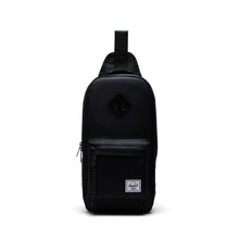 Load image into Gallery viewer, Front panel view of the black sling bag. 
