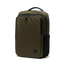 Load image into Gallery viewer, Angled front view of the ivy green Kaslo backpack. 
