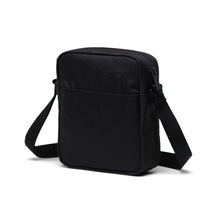 Load image into Gallery viewer, Angled back view of the black cross body bag. 
