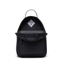 Load image into Gallery viewer, Front view of the black mini backpack with hounds tooth print. The main compartment is unzipped.
