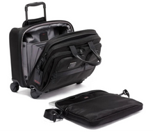 Load image into Gallery viewer, Angeled interior view of the wheeled case with the removable laptop sleeve outside of it. 
