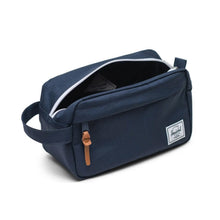 Load image into Gallery viewer, Angled view of the navy blue chapter kit bag with the main compartment unzipped. 

