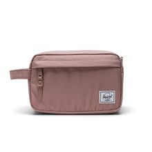 Load image into Gallery viewer, A pink Herschel travel kit with zippered closure, a side handle, and a front pocket.
