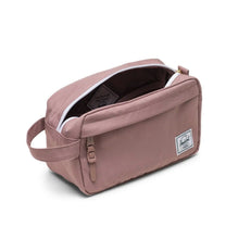 Load image into Gallery viewer, Angled view of the pink travel kit with the main compartment unzipped.
