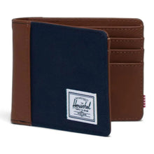 Load image into Gallery viewer, Front view of the navy and tan wallet, part way opened.
