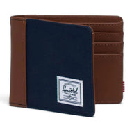 Front view of the navy and tan wallet, part way opened.