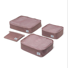 Load image into Gallery viewer, The three rose pink packing cubes and pouch on a white background.
