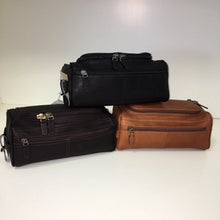 Load image into Gallery viewer, Group shot of three leather shave kit bags in brown, tan, and back.
