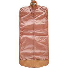 Load image into Gallery viewer, A tan leather garment sleeve extended. 
