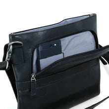 Load image into Gallery viewer, DayTrekr Slim Crossbody Messenger - Black

Image of Front Angled View showing front u-shaped zippered pocket under flap for quick access to your smart phone, cables, power bank or other business travel accessories.

Dimensions:  11.5 x 10 x 1&quot;
