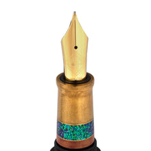 Load image into Gallery viewer, Close up to the fountain pen nib. Its color is yellow-gold. 
