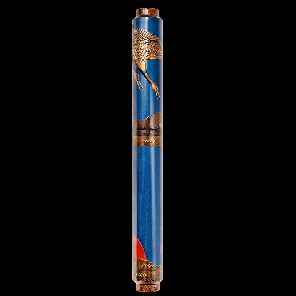 Front view of the Fountain Pen, set on a black background. The pen has a blue background, with a design of the crane featured on the cap.