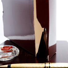 Load image into Gallery viewer, Close up to the closed side of the sleeve. There is some damage to the cardboard.
