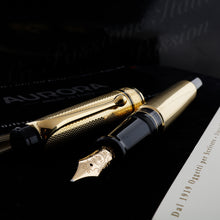 Load image into Gallery viewer, The fountain pen with the cap set next to it. Placed on top of the presentation box. 
